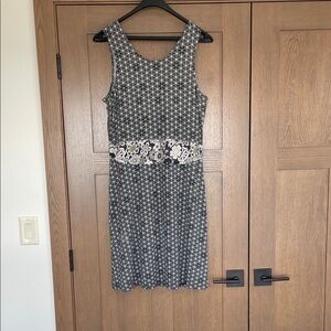 Sleeveless Black and White Reversible Dress with Floral Waist Detail